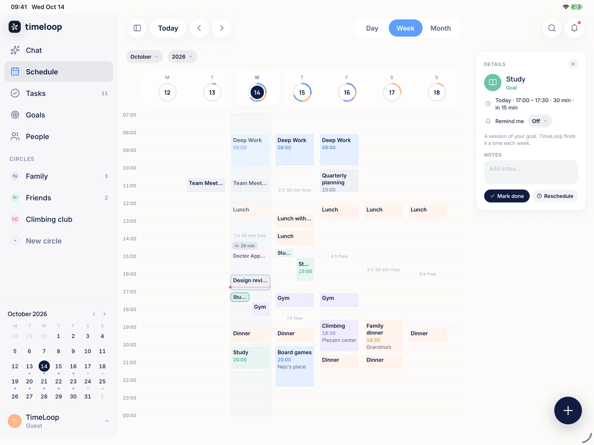 TimeLoop on an iPad held sideways: the week, seven days side by side with their events and a ring on each day, and a session open beside them
